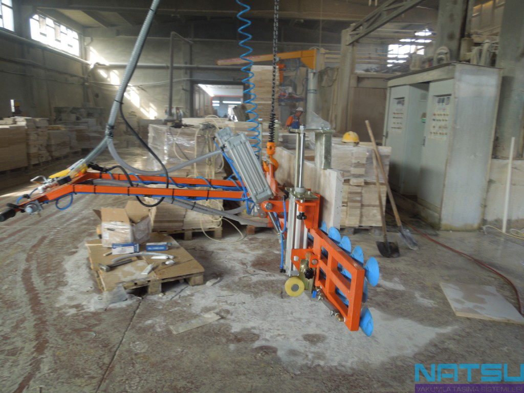 block cutter machine unloading for vacuum device